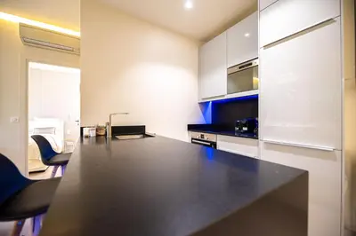 Cuisine ou kitchenette dans l'établissement MBM - LA TOUR