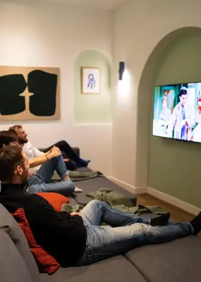 Télévision ou salle de divertissement dans l'établissement Edgar Suites Notre-Dame - Lagrange
