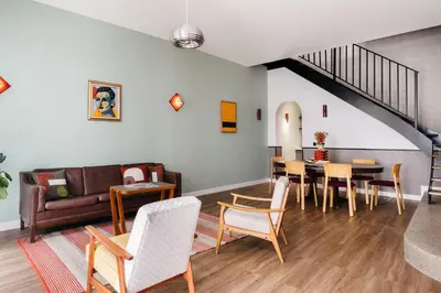 Coin salon dans l'établissement Edgar Suites Notre-Dame - Lagrange