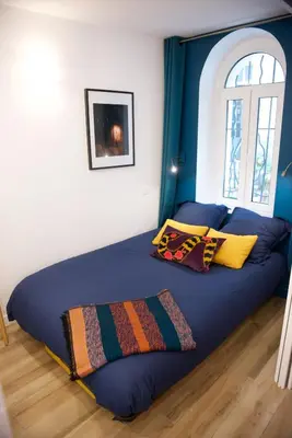 Un ou plusieurs lits dans un hébergement de l'établissement CHARMING Parisian Apartment WITH AIR CONDITIONING - CLIMATISATION & 2 BEDROOMS - Batignolles PARIS