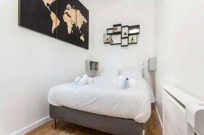 Un ou plusieurs lits dans un hébergement de l'établissement Comfortable apartment - 1BR-4P - Close to Bastille