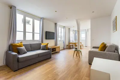Coin salon dans l'établissement Appartement8P/Full Equipped/BONNE NOUVELLE/BOURSE