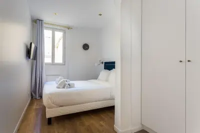 Un ou plusieurs lits dans un hébergement de l'établissement Appartement8P/Full Equipped/BONNE NOUVELLE/BOURSE