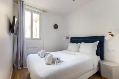 Un ou plusieurs lits dans un hébergement de l'établissement Appartement8P/Full Equipped/BONNE NOUVELLE/BOURSE