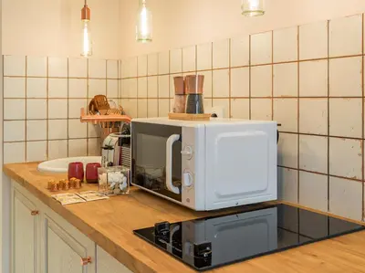 Cuisine ou kitchenette dans l'établissement Pink & Wood cocoon