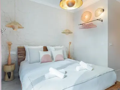 Un ou plusieurs lits dans un hébergement de l'établissement Pink & Wood cocoon