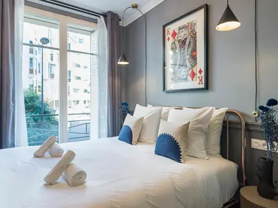 Un ou plusieurs lits dans un hébergement de l'établissement The Blue King Suite