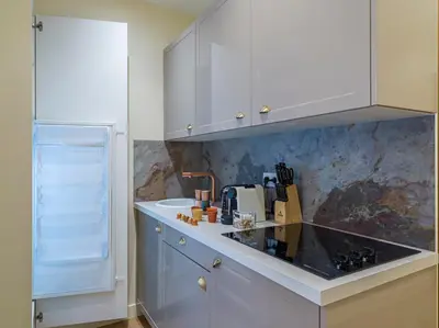 Cuisine ou kitchenette dans l'établissement The Gatsby Suite