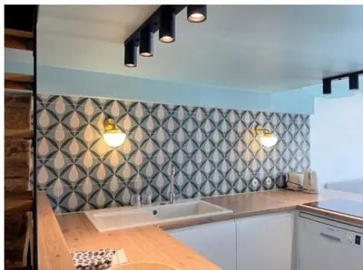 Cuisine ou kitchenette dans l'établissement Appartement Atypique Au Pied Du Sacré Cœur