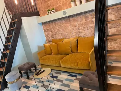 Coin salon dans l'établissement Appartement Atypique Au Pied Du Sacré Cœur