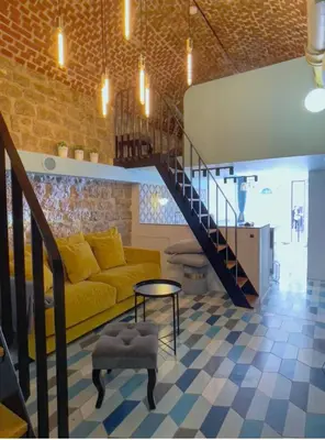 Coin salon dans l'établissement Appartement Atypique Au Pied Du Sacré Cœur