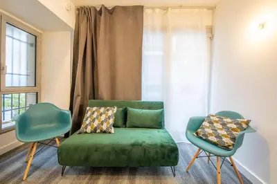 Coin salon dans l'établissement New Apt Near Bois de Vincennes - 2 Persons