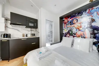 Un ou plusieurs lits dans un hébergement de l'établissement 213 Suite Givenchy - Superbe Appartement à Paris