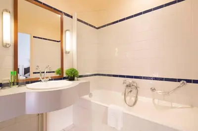 Salle de bains dans l'établissement HOTEL DU PRINTEMPS