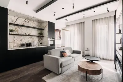 Coin salon dans l'établissement HIGHSTAY - Luxury Serviced Apartments - North Marais 1