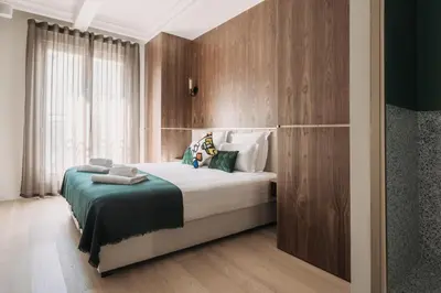 Un ou plusieurs lits dans un hébergement de l'établissement HIGHSTAY - Luxury Serviced Apartments - North Marais 1
