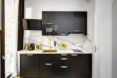 Cuisine ou kitchenette dans l'établissement 206 Suite Hermès - Superb apartment in Paris