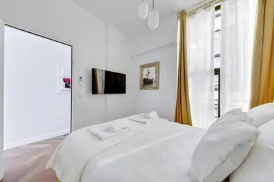 Un ou plusieurs lits dans un hébergement de l'établissement 208 Suite Guerlain - Superb apartment in Paris