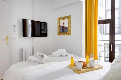 Un ou plusieurs lits dans un hébergement de l'établissement 210 Suite Chanel - Superb apartment in Paris