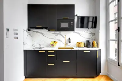 Cuisine ou kitchenette dans l'établissement 210 Suite Chanel - Superb apartment in Paris