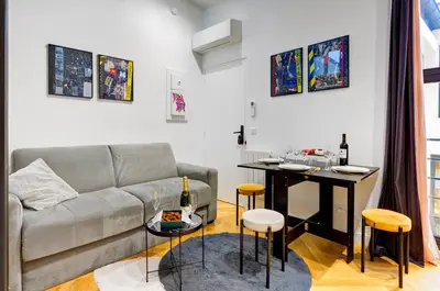 Coin salon dans l'établissement 214 Suite Vuitton - Superb Apartment in Paris
