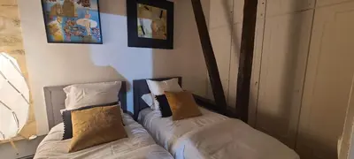 Un ou plusieurs lits dans un hébergement de l'établissement High Stay Saint Germain de Pres Paris 6