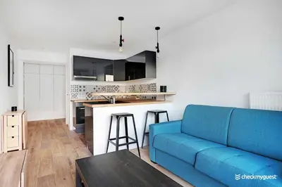 Cuisine ou kitchenette dans l'établissement Cozy apartment - 1BR-4P - next to Paris