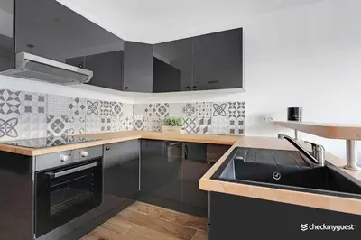 Cuisine ou kitchenette dans l'établissement Cozy apartment - 1BR-4P - next to Paris