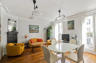 Coin salon dans l'établissement Appartement Duhesme - Welkeys