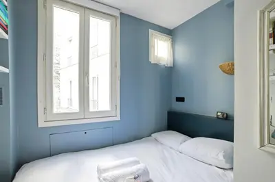 Un ou plusieurs lits dans un hébergement de l'établissement Appartement Duhesme - Welkeys