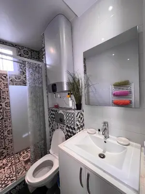 Salle de bains dans l'établissement Logesty Home proche Paris et Metro