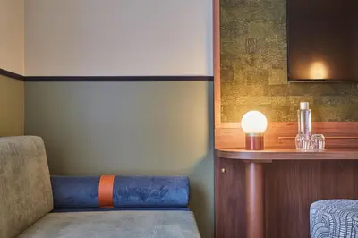 Coin salon dans l'établissement Voco Paris - Porte de Clichy