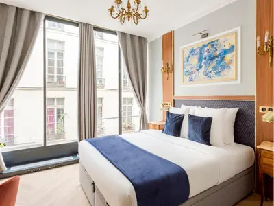 Un ou plusieurs lits dans un hébergement de l'établissement Merveil - Luxury Suite - Louvre - Reaumur I