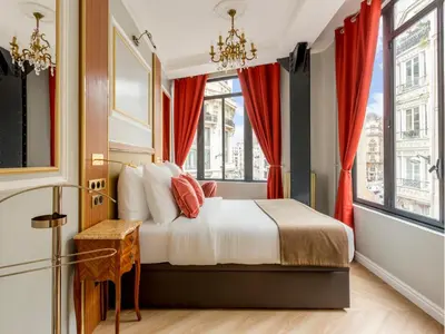 Un ou plusieurs lits dans un hébergement de l'établissement Merveil - Luxury Suite - Louvre - Reaumur I