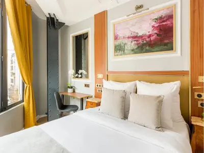 Un ou plusieurs lits dans un hébergement de l'établissement Merveil - Luxury Suite - Louvre - Reaumur I