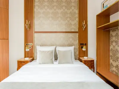 Un ou plusieurs lits dans un hébergement de l'établissement Merveil - Luxury Suite - Louvre - Reaumur II