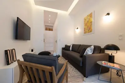 Télévision ou salle de divertissement dans l'établissement Mayenne