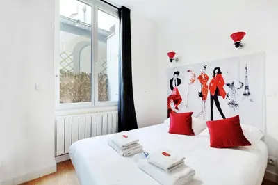 Un ou plusieurs lits dans un hébergement de l'établissement Charming and calm studio - 4P -Beaubourg Quarter
