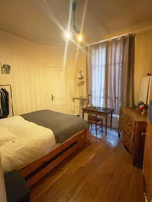 Un ou plusieurs lits dans un hébergement de l'établissement beautiful flat in the center of Paris 6 th district