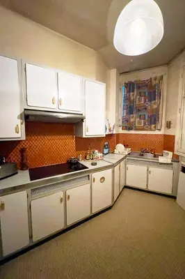 Cuisine ou kitchenette dans l'établissement beautiful flat in the center of Paris 6 th district