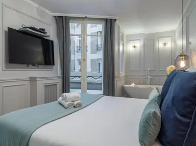 Un ou plusieurs lits dans un hébergement de l'établissement The Blue Pearl