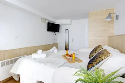 Un ou plusieurs lits dans un hébergement de l'établissement 204 Suite Coco - Superb apartment in Paris