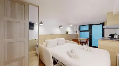 Un ou plusieurs lits dans un hébergement de l'établissement 204 Suite Coco - Superb apartment in Paris