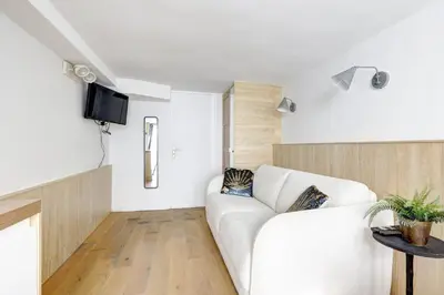 Télévision ou salle de divertissement dans l'établissement 204 Suite Coco - Superb apartment in Paris