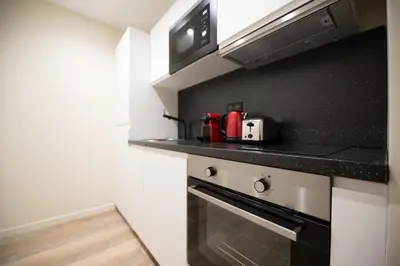 Cuisine ou kitchenette dans l'établissement MBM - Bastille Marais