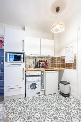 Cuisine ou kitchenette dans l'établissement Opéra Cozy Flat