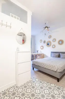 Un ou plusieurs lits dans un hébergement de l'établissement Opéra Cozy Flat