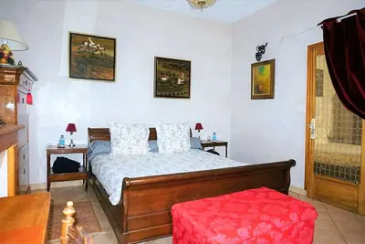 Un ou plusieurs lits dans un hébergement de l'établissement La Maison Rouge