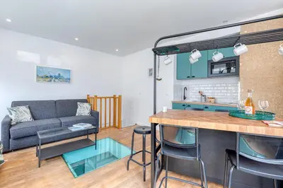 Cuisine ou kitchenette dans l'établissement Les Vignes de Montmartre