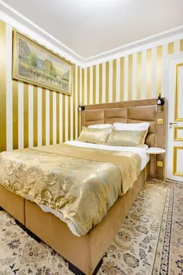 Un ou plusieurs lits dans un hébergement de l'établissement Premium studio 2 minutes walk from Champs-Elysees